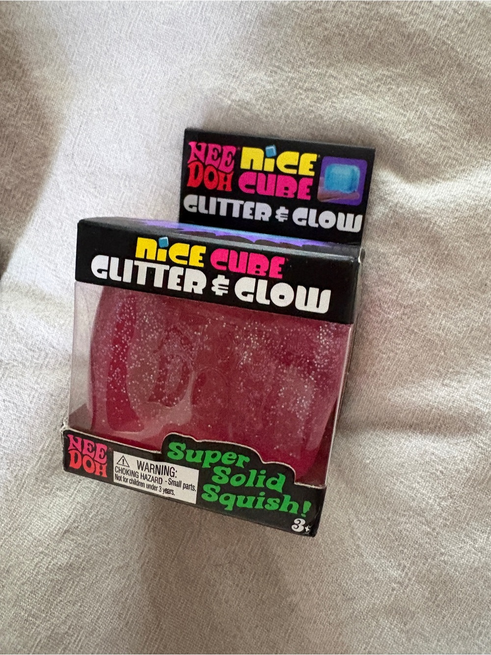 NeeDoh Nice Cube Glitter & Glow Super Solid Squish - Pink